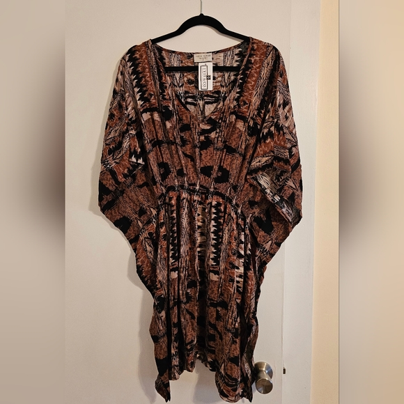 Dresses & Skirts - Brand new with tags dress with cinched waist in size Medium